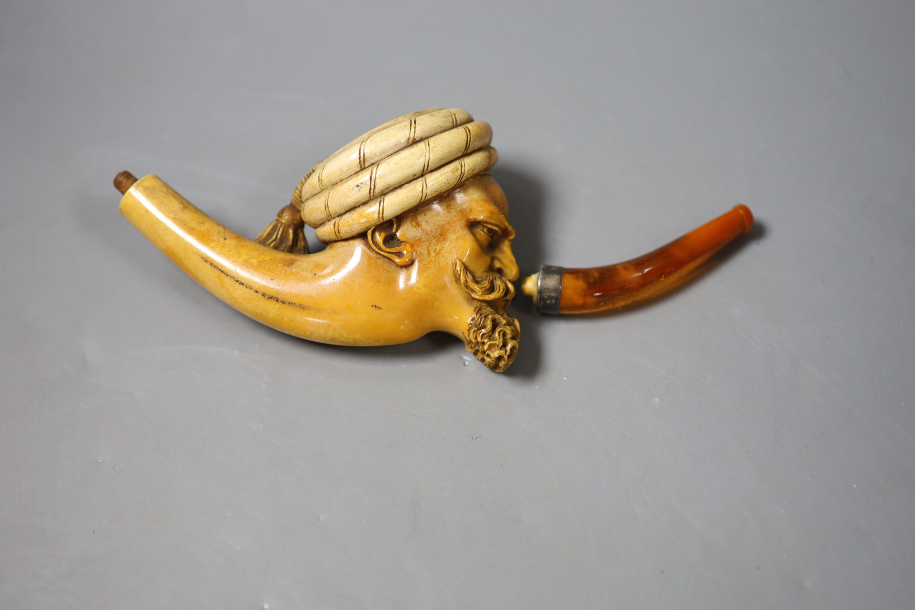 A late 19th century Meerschaum pipe of an Arab gentleman, 14cm